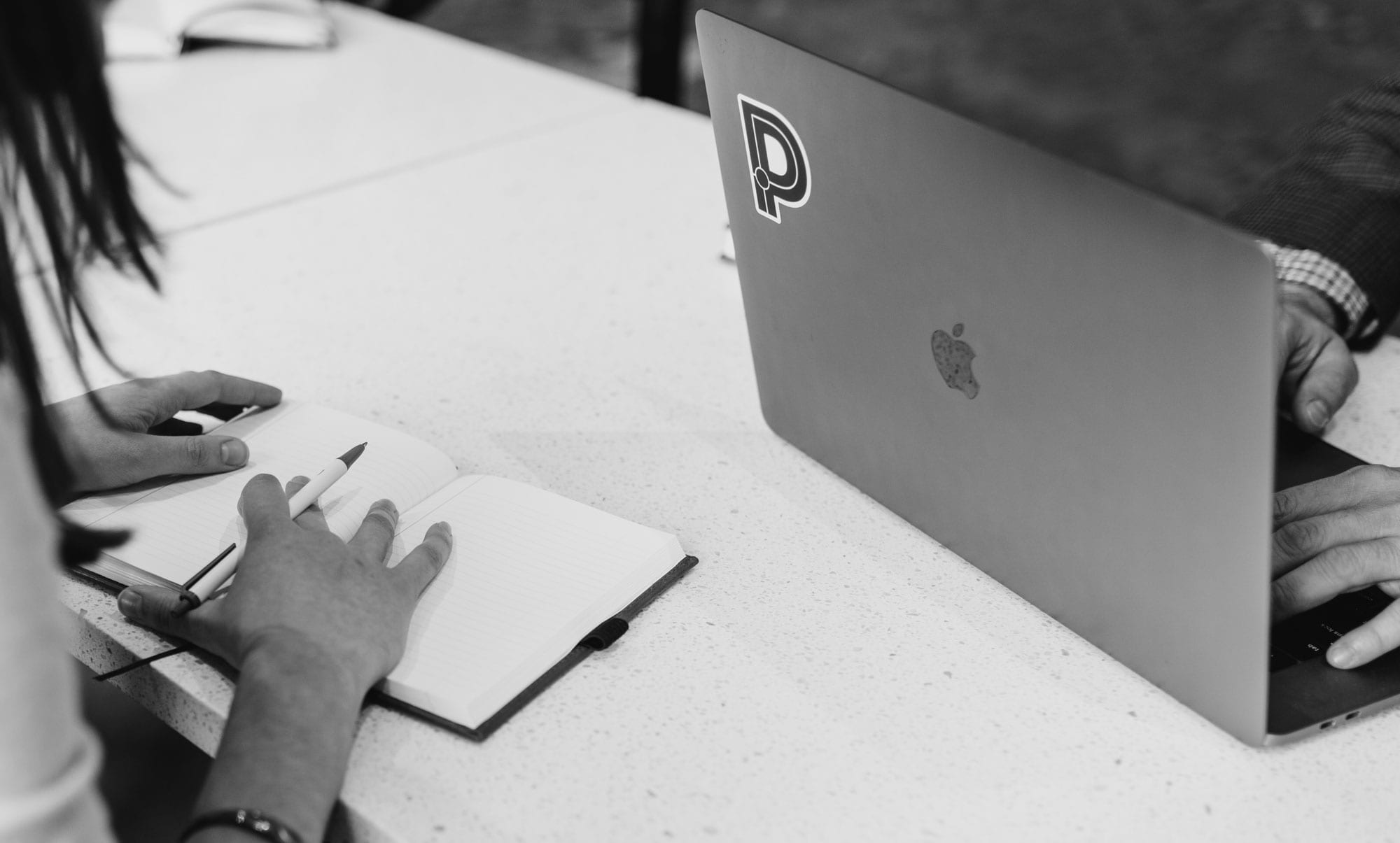 Parkway Digital team with notebook and laptop